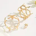 ensemble élégant de trois pièces présentant plusieurs motifs d'étoiles