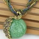 Collier pendentif vintage bohème feuille & paon 